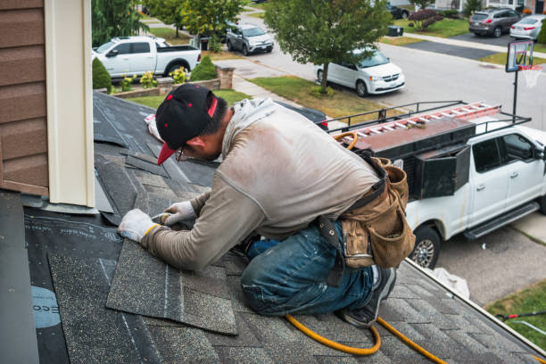 Professional Roofing technician working in Blue Rock, OH